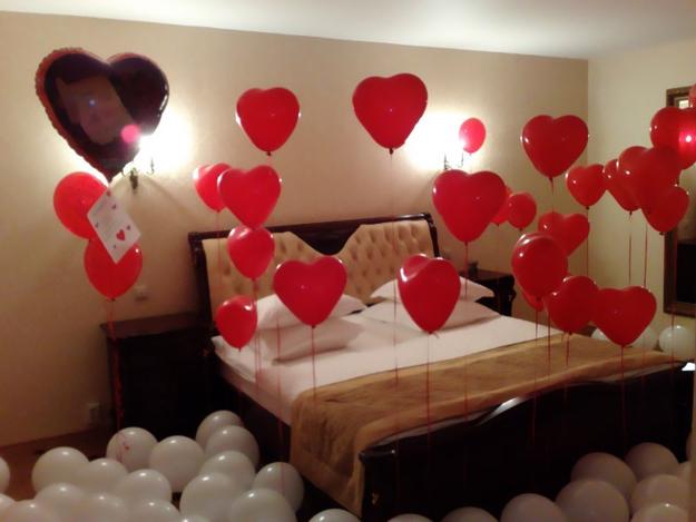 Valentines Helium Balloons on a bed