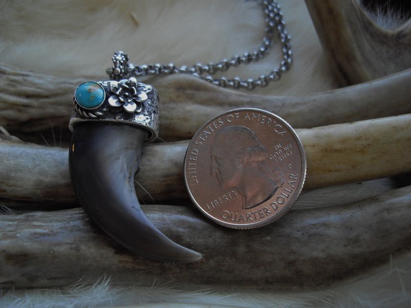 genuine bear claw set in a sterling silver and turquoise cap Bear