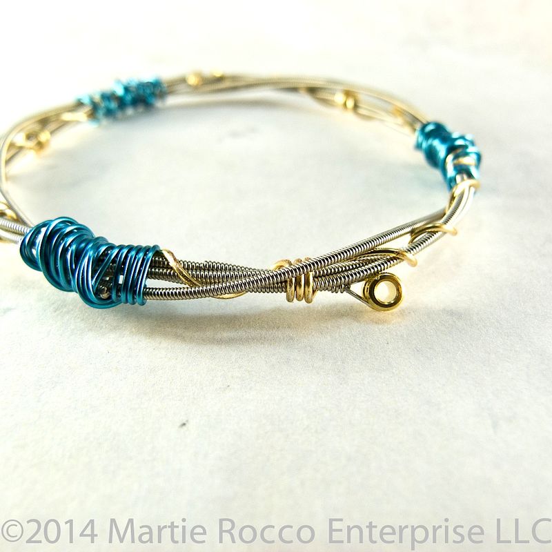 Guitar String Bangle bracelet double coiled brass and blue wire wrap