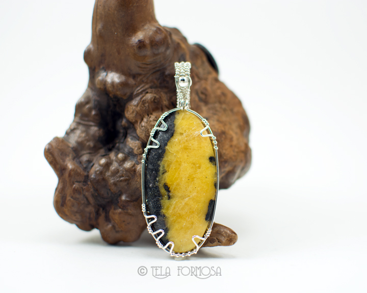 cancrinite pendant sterling silver wire wrapped tela formosa