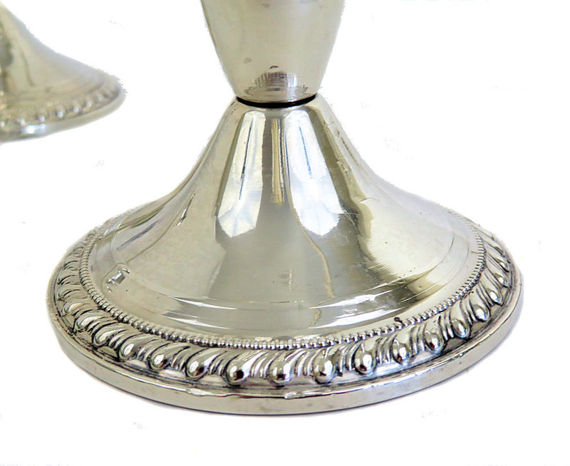 A Pair of Duchin Creation Sterling Silver Triple Candle Holders From