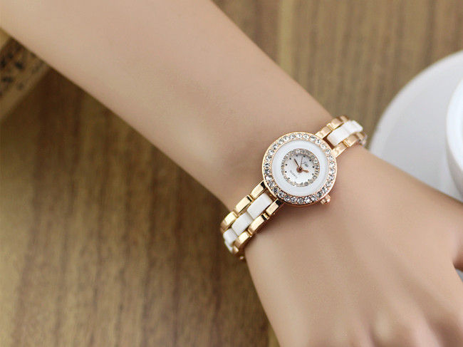 GOLD WITH WHITE TONE WATCH - product image