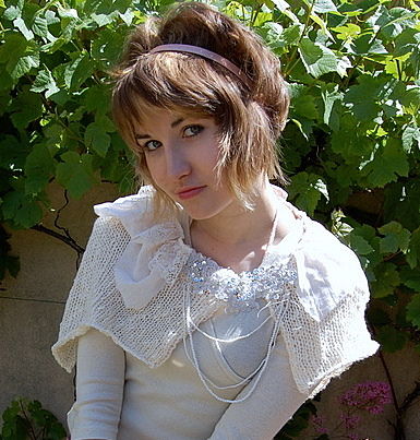 Knitted,capelet,with,handmade,corsage,cardigan,coat,knitwear
