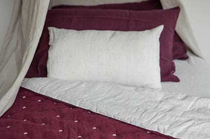 a cosy bed made of stylish italian handmade linen