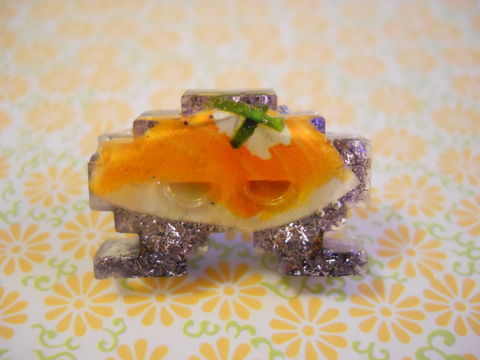 Lilac,Sushi,Space,Invader,Resin,Ring,harajuku Space Invader shaped resin filled with lilac glitter strands, food decorated with a salmon sushi, all on a nickel free adjustable ring base.