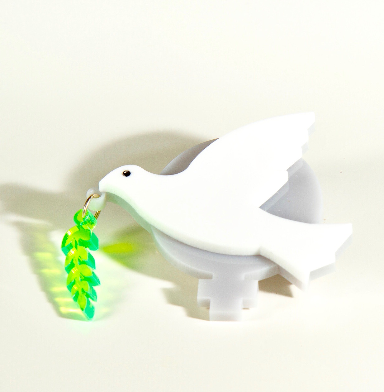 Women for peace brooch
