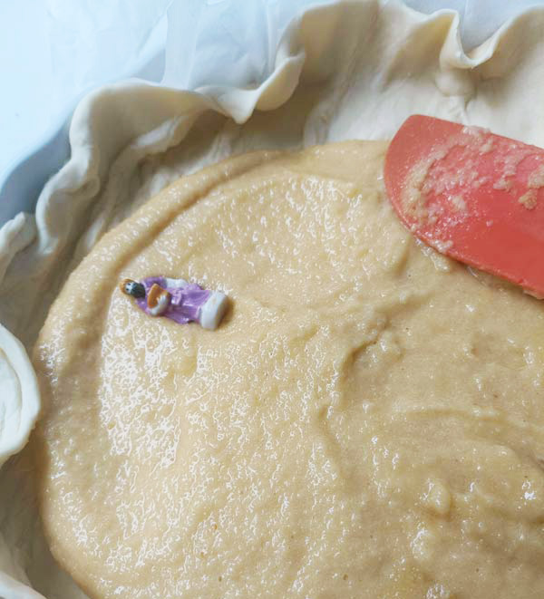 Laying teh feve into frangipane - French Kings cake recipe