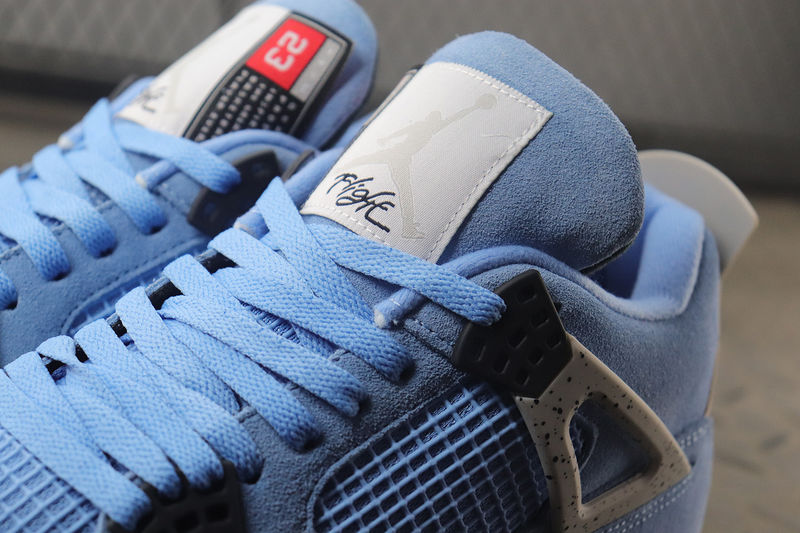 stockx jordan 4 retro university blue