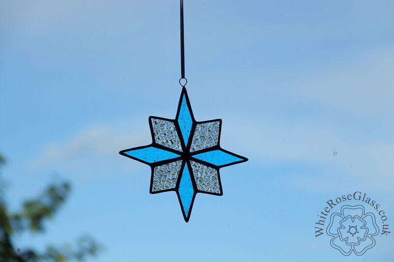 Star 8-Point Christmas Light Blue/Clear Suncatcher - product image