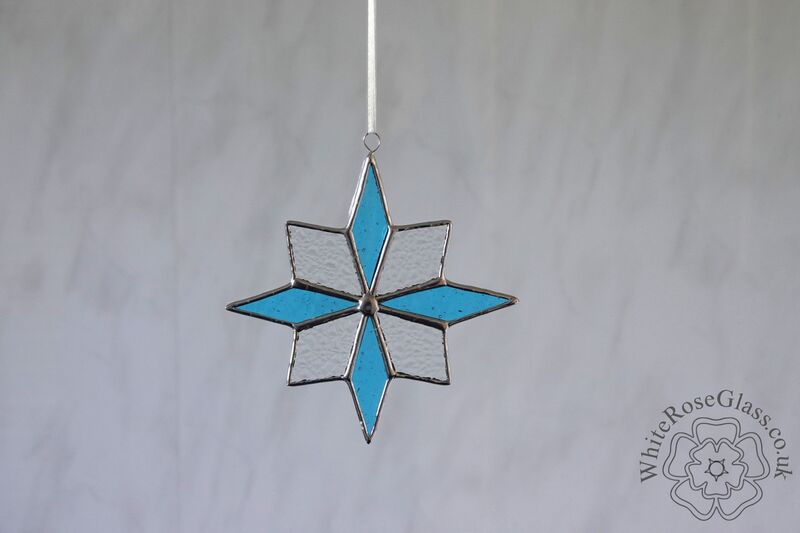 Star 8-Point Christmas Light Blue/Clear Suncatcher - product image