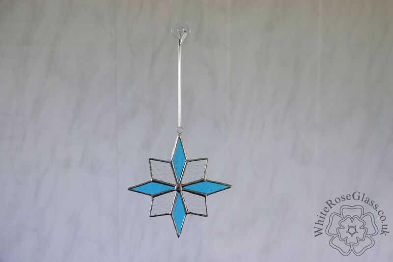 Star 8-Point Christmas Light Blue/Clear Suncatcher - product image