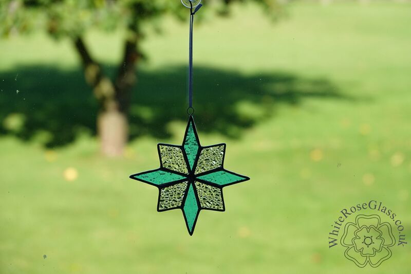 Star 8-Point Christmas Light Blue/Clear Suncatcher - product image