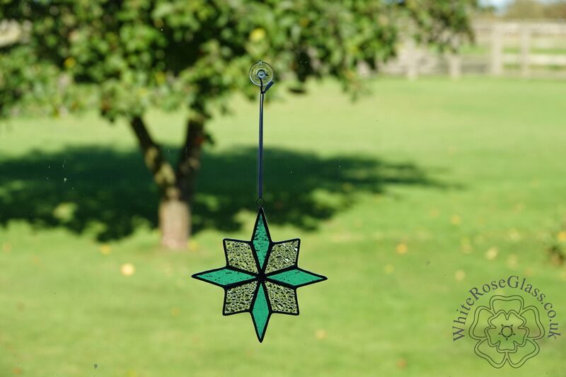 Star 8-Point Christmas Light Blue/Clear Suncatcher - product image