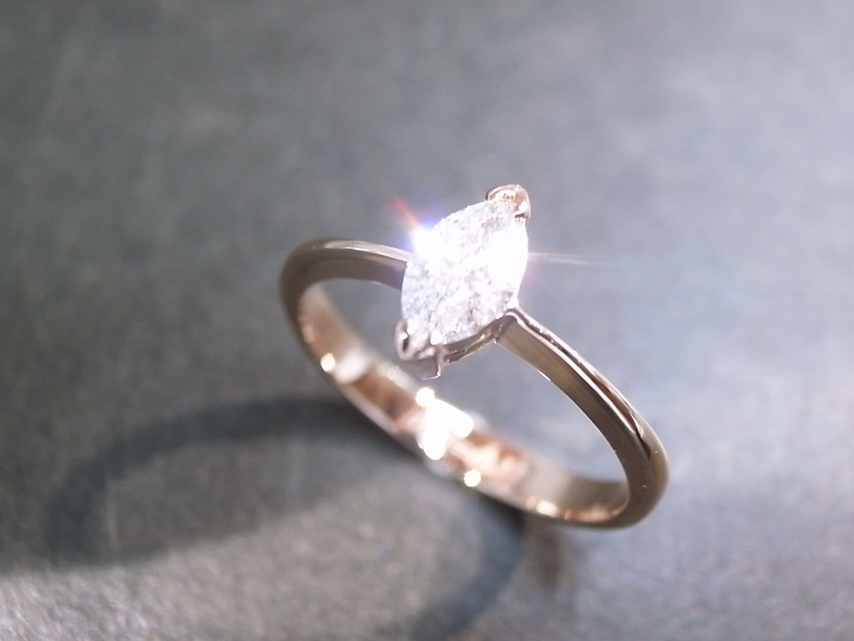 Wedding ring with marquise engagement ring