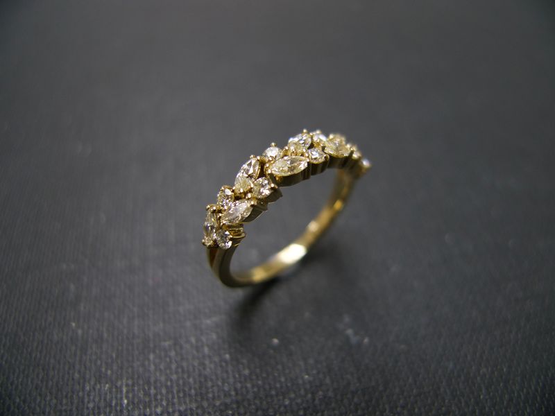 Marquise Diamond Wedding Ring - HN Jewelry Product Specifications:- 8 Round Brilliant Cut Diamonds with 0.16ct- 8 Marquise Shaped Diamonds with 0.35ct- Quality: M-N in Color and VS in Clarity