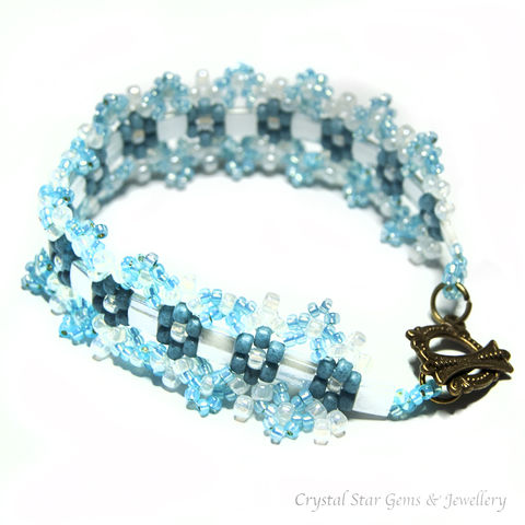 Pale,Blue,and,White,Aztec,Daisy,Bracelet,bracelet, beaded, beadwork, pale blue, white, aztec daisy, daisy