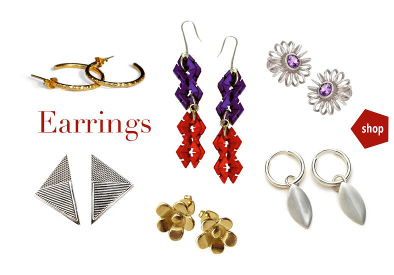designer earrings in silver and gold