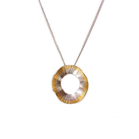 Sunray,necklace,gold,&,silver,small,by,Shirani,Fernando,Shirani Fernando, gold and silver textured circle pendant