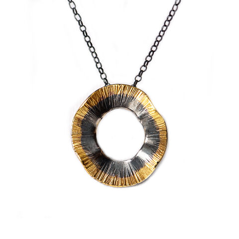 Sunray,necklace,black,&,gold,small,by,Shirani,Fernando,Shirani Fernando, gold textured circle pendant with black chain