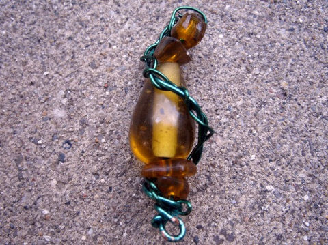Natural,Amber,Pendant,with,Green,Twisted,Wire,Wrapping,Jewelry,Wire_Wrapped,amber,hunter_green,wire_wrapped,pendant,fall,autumn,wire,green,orange,brown,yellow,twist,Michigans_Trolls,glass_bead,natural_amber_pieces,aluminum_wire