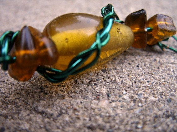 Natural Amber Pendant with Green Twisted Wire Wrapping - product images  of 