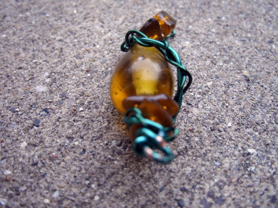 Natural Amber Pendant with Green Twisted Wire Wrapping - product images  of 