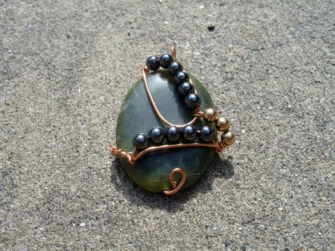 Wire,Wrapped,Green,Polished,Stone,with,Hematite,and,Gold,Toned,Bead,Accents,Jewelry,Pendant,Wire_Wrapped,polished_stone,hematite,black,copper,wire,wire_wrapped,gold_toned_beads,gold_beads,swirl,loop,oval,Michigans_Trolls,green_polished_stone,copper_wire,hematite_beads