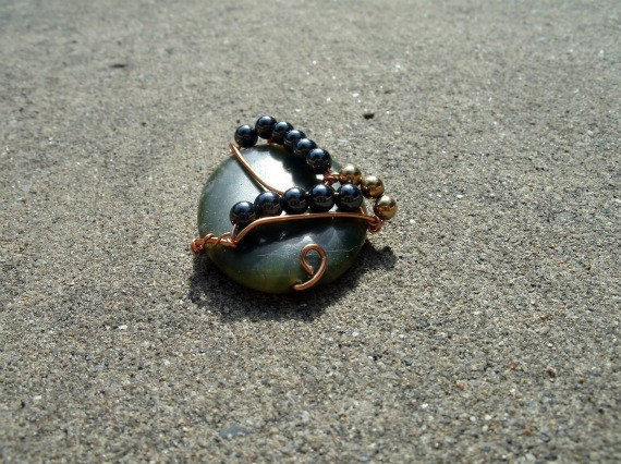 Wire Wrapped Green Polished Stone with Hematite and Gold Toned Bead Accents - product images  of 