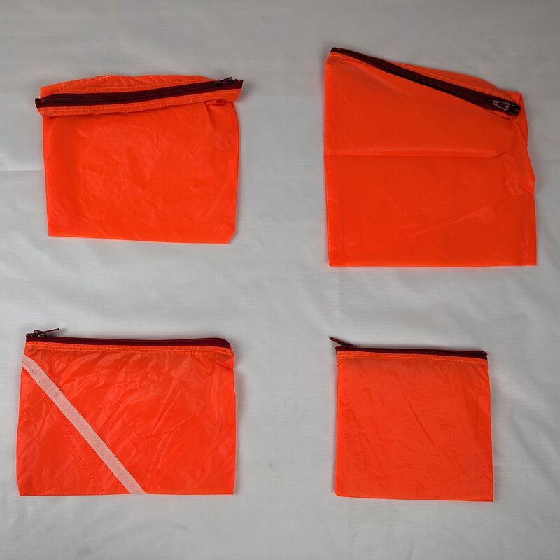 Four Neon Orange Repurposed Parachute Zipper Pouches with Red Zippers - product images  of 