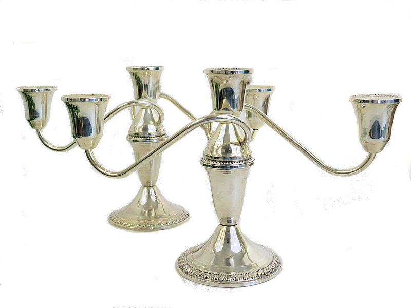 A Pair of Duchin Creation Sterling Silver Triple Candle Holders From
