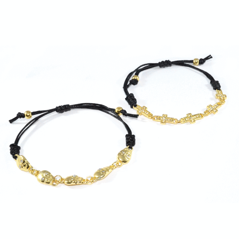 BLACK STRAP WITH GOLD TONE CHARMS BRACELET - product image  