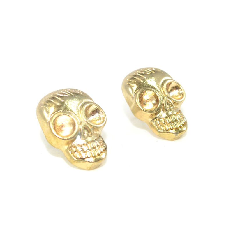 GOLD TONE SKULL HEAD EARRINGS - product image  