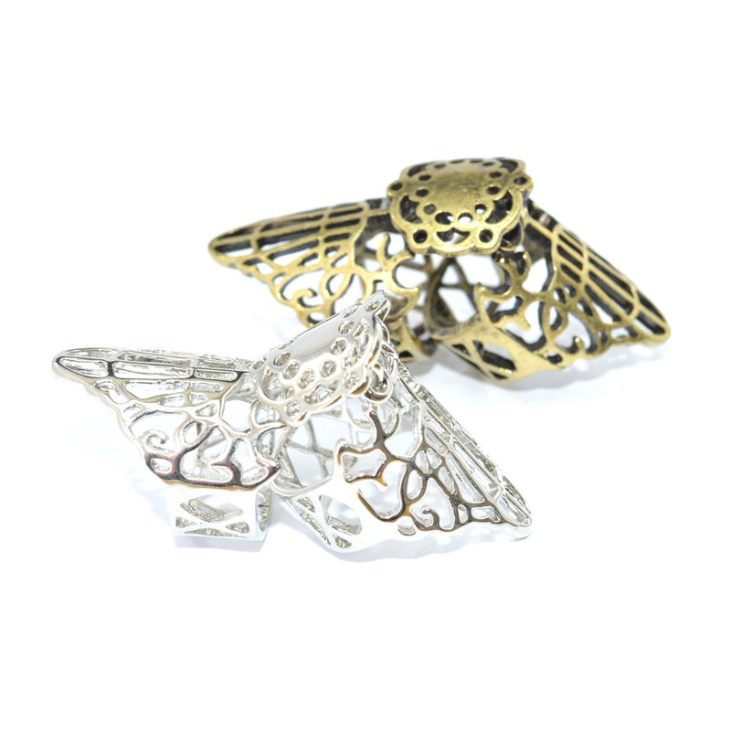 VINTAGE STYLE HOLLOW PATTERN MOVABLE KNUCKLE RING - product image  