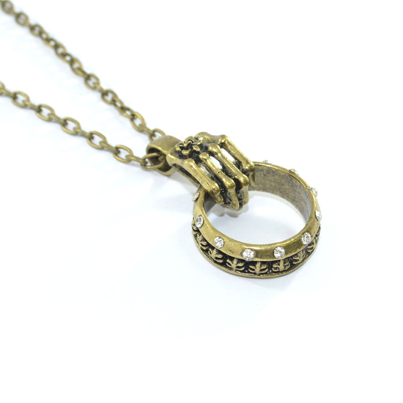 VINTAGE SKELETON HAND WITH RATTLE NECKLACE - product image  