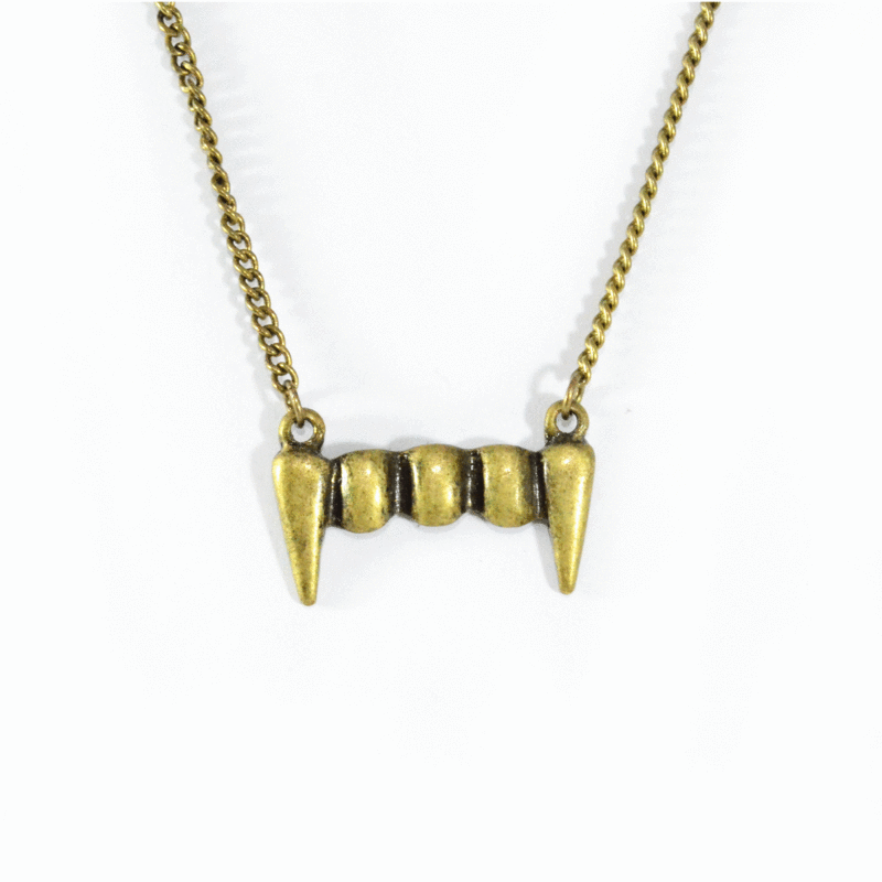 VINTAGE GOLD VAMPIRE TEETH NECKLACE - product image  