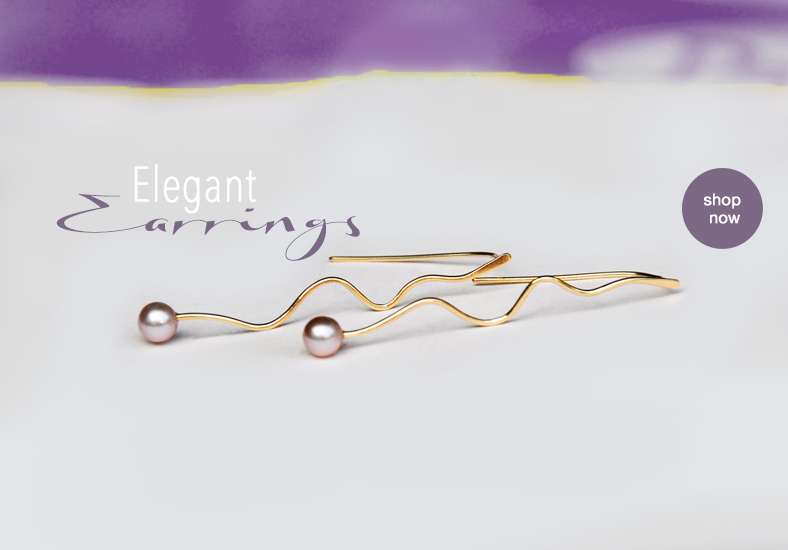 designer earrings in silver and gold by Katerina Damilos