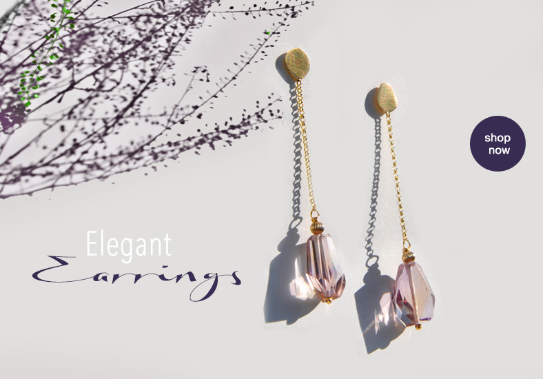 elegant earrings in silver and gold by Katerina Damilos