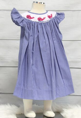 Whale,Birthday,,One,Year,Old,Birthday,Party,,Zuli,KIds,412619-,413907-CC195,Whale Birthday Dress, Whale Birthday Outfit – First Birthday Dress – Infant Birthday Outfit by Zuli Kids  She’ll look adorable for her whale birthday party in this sweet blue smocked bishop dress by Zuli Kids. Hand-stitched smocked dress is ble gingham an