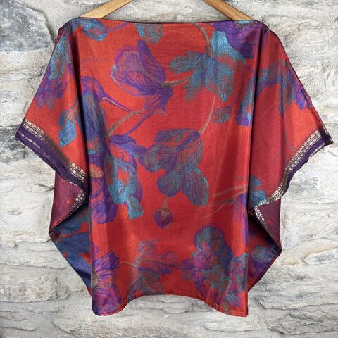 FREEDOM,TOP,SEE-THROUGH,ONE,SIZE,UK,12,to,20:,deep,orange,red,with,purple,and,blue,flowers,Orange, purple, blue, floral, freedom, top, on, the verge, polyester, uk, 12,14,16,18,20 