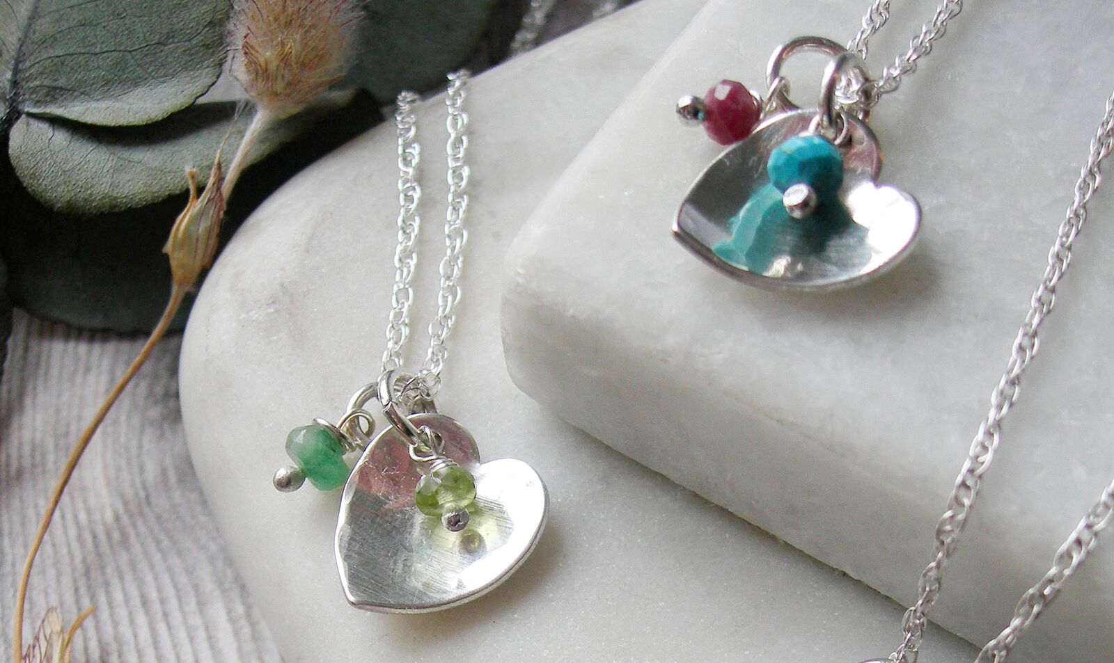 sterling silver heart pendants with multicoloured gemstones