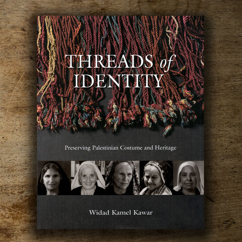Threads,of,Identity:,Preserving,Palestinian,Costume,and,Heritage,book, craft book, Palestinian embroidery book, cross stitch, textile book, Palestinian embroidery, tatreez, tatreez and tea, rimal books, widad kawar,  Widad Kamel Kawar, Palestinian heritage, palestinian women , wafa ghnaim, palestinian diaspora, palesti