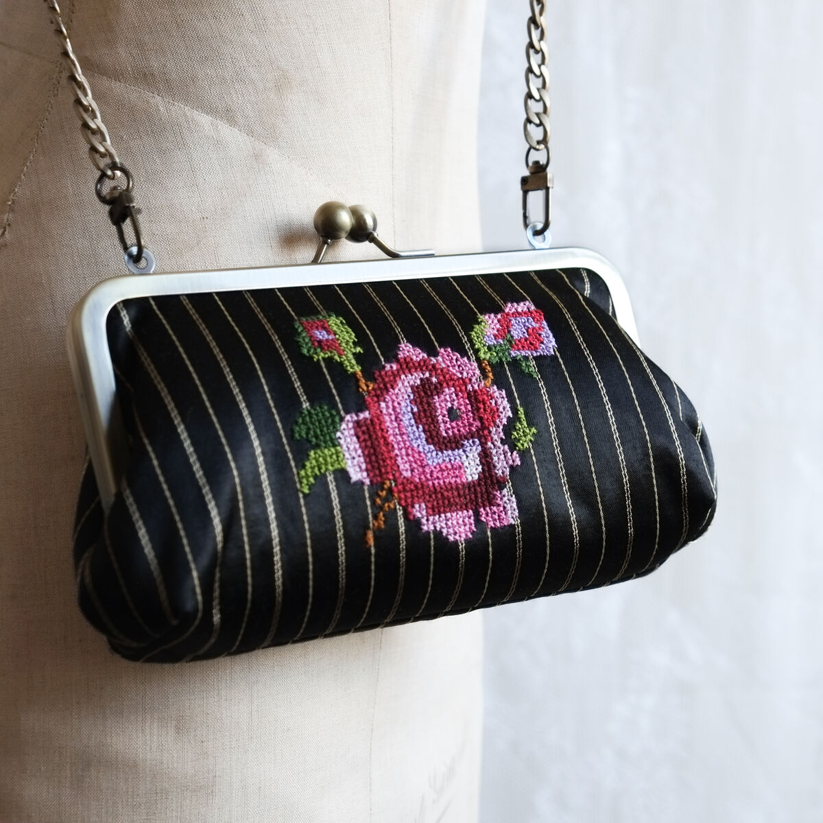 The rose kisslock clutch - Palestinian embroidery / Tatreez / تطريز -  Designed by Grace Abdo - Embroidered by Women in Hebron - product images  of 