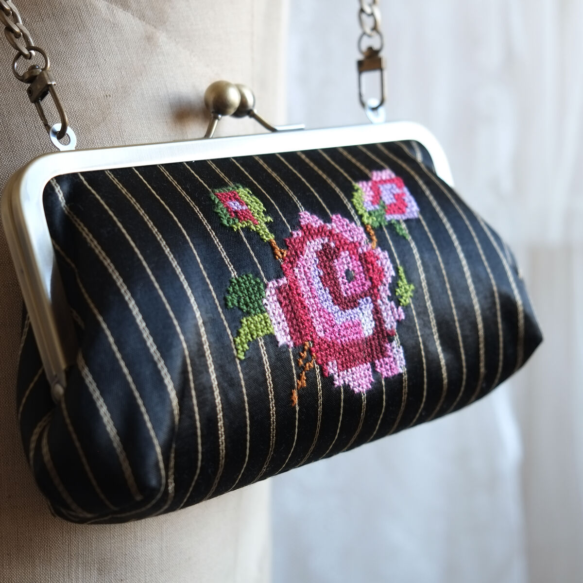 The rose kisslock clutch - Palestinian embroidery / Tatreez / تطريز -  Designed by Grace Abdo - Embroidered by Women in Hebron - product images  of 