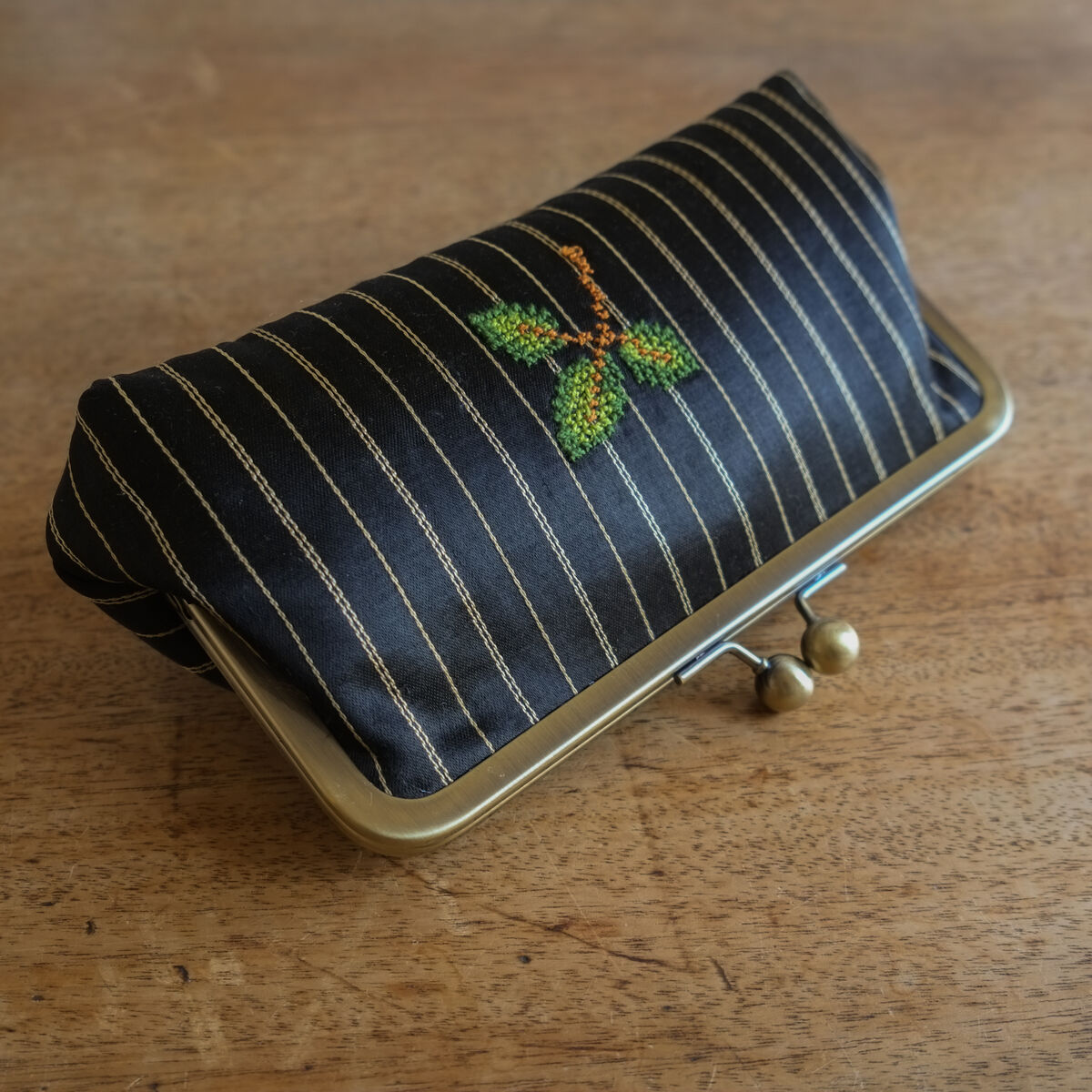 The rose kisslock clutch - Palestinian embroidery / Tatreez / تطريز -  Designed by Grace Abdo - Embroidered by Women in Hebron - product images  of 