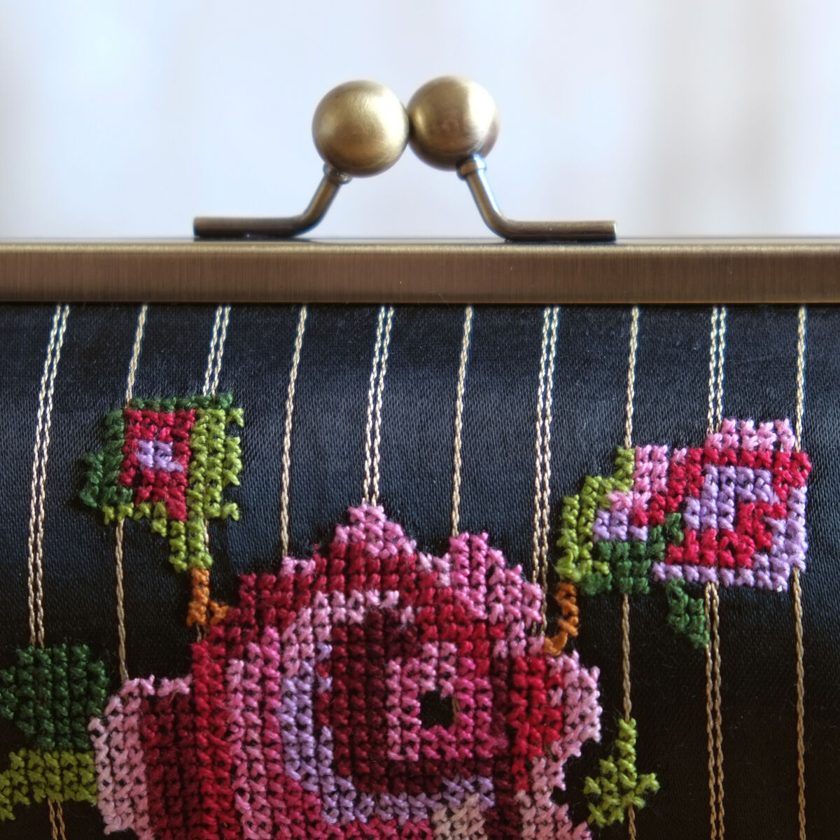 The rose kisslock clutch - Palestinian embroidery / Tatreez / تطريز -  Designed by Grace Abdo - Embroidered by Women in Hebron - product images  of 