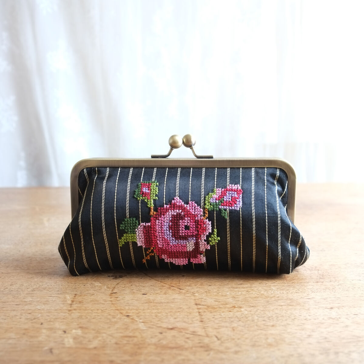 The rose kisslock clutch - Palestinian embroidery / Tatreez / تطريز -  Designed by Grace Abdo - Embroidered by Women in Hebron - product images  of 