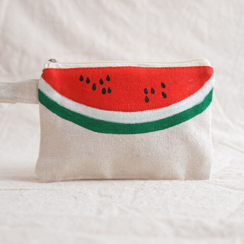 A,Slice,of,Solidarity,pouch,-,by,Ibrahim,Muhtadi,gaza, Ibrahim Muhtadi, pouch, purse, canvas, canvas pouch, hand painted, Reem Motasem, made in palestine