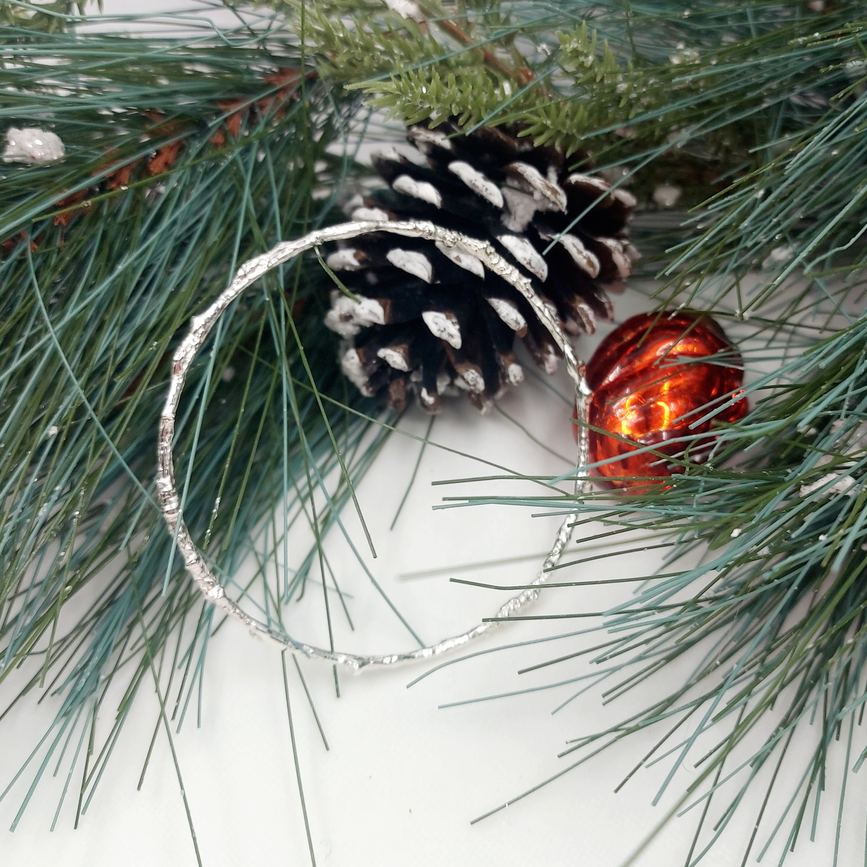 handmade silver bangle cast from real twigs by silver sparrow jewellery