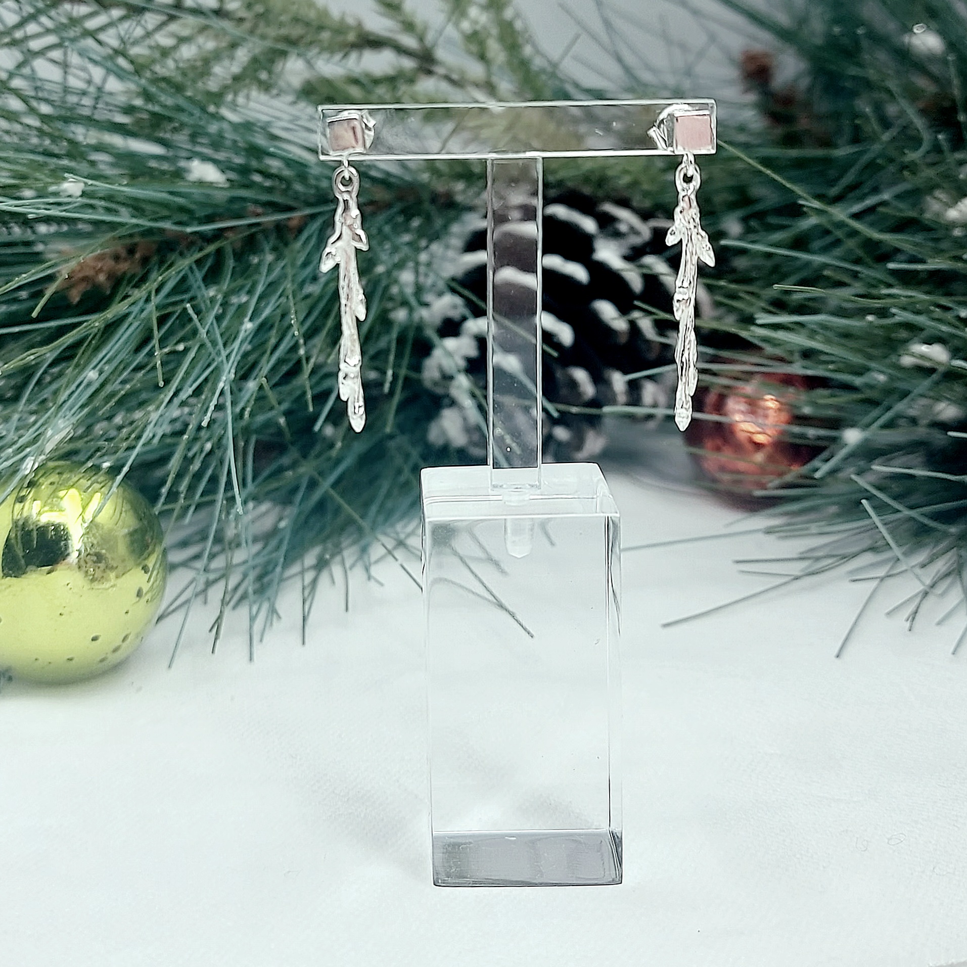 Handcrafted silver drop earrings cast from real twigs by Silver Sparrow Jewellery