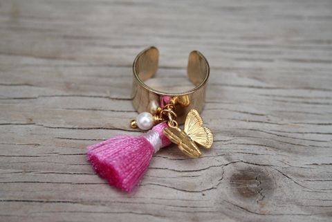 anello,farfalla,perla,e,nappina,rosa